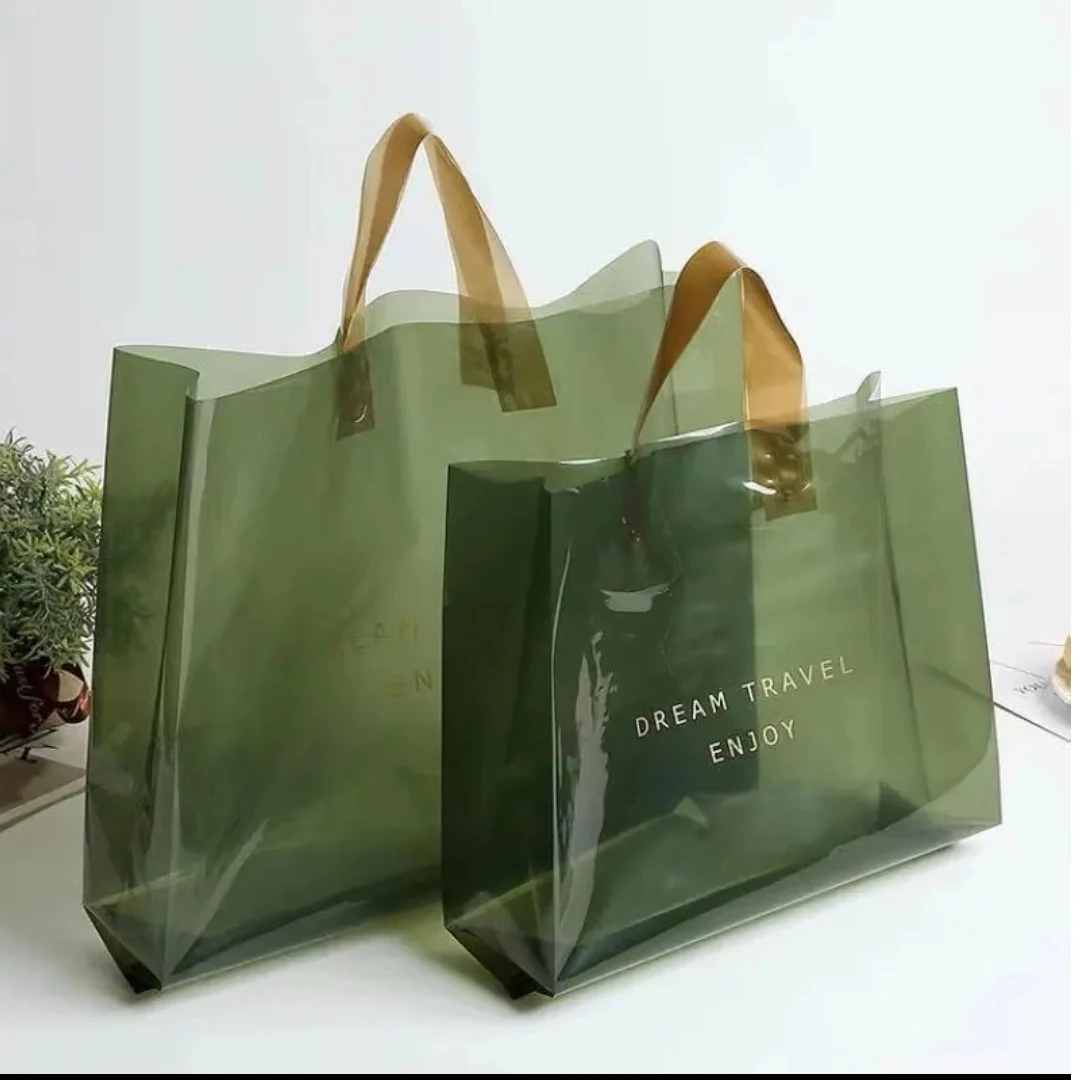 Supplied product image showing green printed carry bags with loop handles